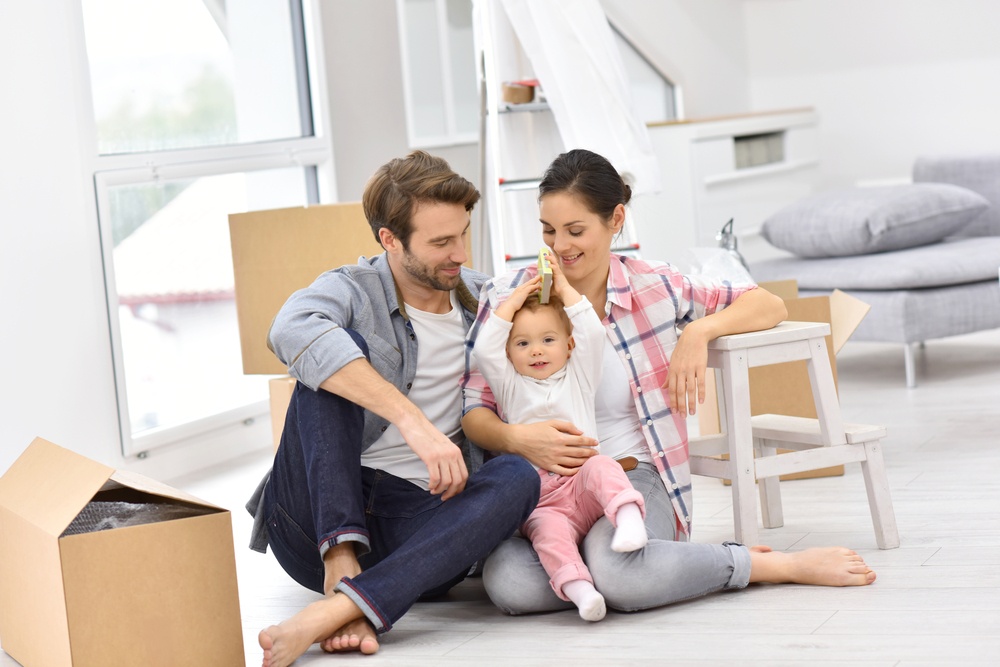 Young family moving into new home